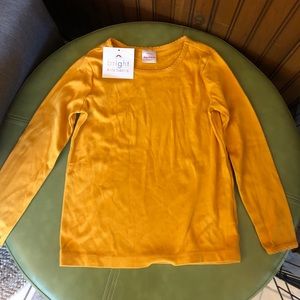 NWT. Girls US 5 top by Hanna Andersson. Yellow.
